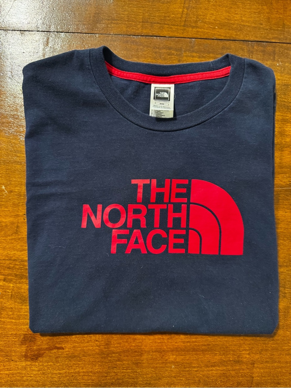 The North Face Men's Navy T-Shirt with Red Logo